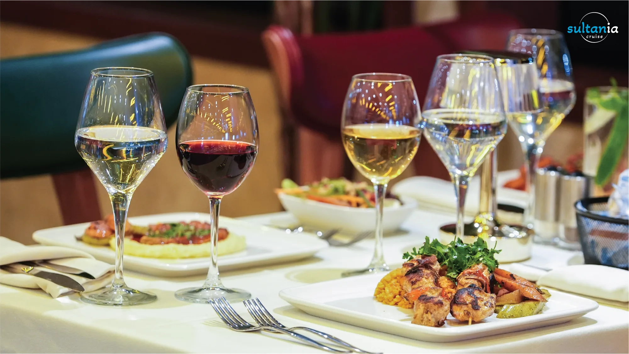 Grilled chicken skewers with rice served with wine on the dinner cruise