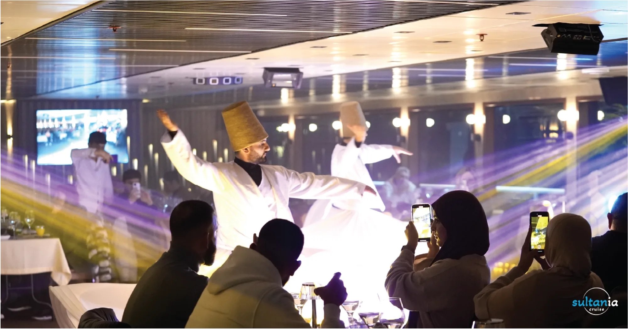 Whirling dervishes performing a Sufi dance for guests on the boat